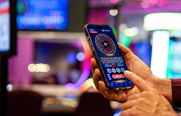 abang88 live casino interface with blackjack and roulette tables on mobile